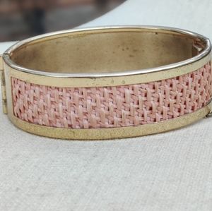 Unusual vintage hinged bracelet with pink fabric and safety chain